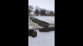 Watch huge sheets of ice break off of the Big Sioux River