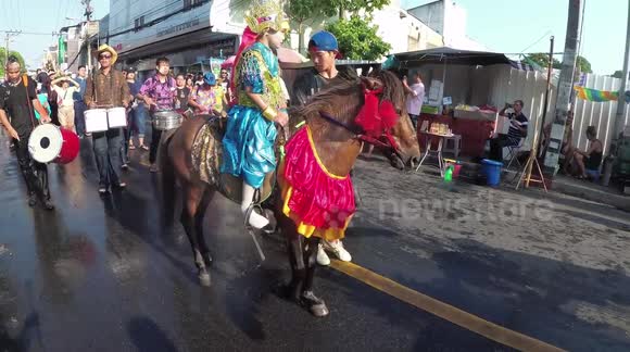 Songkran festivities heat up as temperatures near 40 celcius