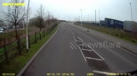 Idiot caught on camera drifting round a roundabout