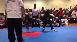 Boy knocks out opponent in seconds with a savage spinning hook kick