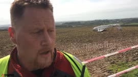 Pilot has miracle escape after crashing his plane upside down into a field