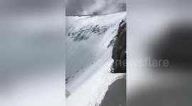Skiers escape injury after plummeting nearly 500 feet down mountain