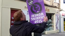 Man confronts protester in Ireland tearing down 'yes' vote posters