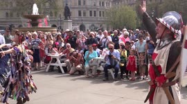 Actors perform the battle of St.George and a dragon for England Day on Trafalgar square, London 2018