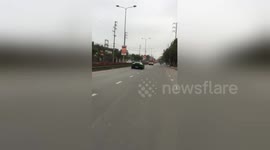 Newsflare Edit - Multi-coloured super-car convoy seen in Vietnam