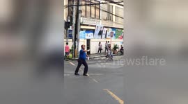 Policeman dances non-stop for ages while directing traffic at busy junction