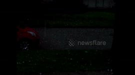 Quarter size hail pouring down like rain