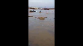 rescue workers bus from one factory were rescued from drowning after the bus sank below them