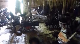 Bisj Pole Ceremony Dance in Longhouse Omandecep, Asmat Region, Papua, Indonesia