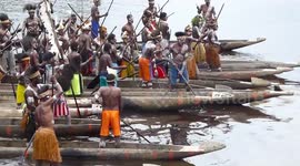 Bisj Pole Ceremony, War-canoe arrival, Omandecep, Asmat Region, Papua, Indonesia