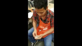 Magician Magic Mike showing retail workers how to make extra money using magic