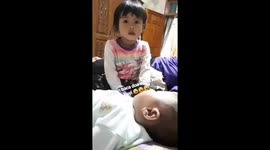a 3-year-old Muslim toddler teaches prayer to sleep to her 6-month-old sister