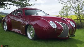 A cabinet maker has converted a Jaguar into his own unique, retro supercar -- made out of expanding FOAM and fibreglass.