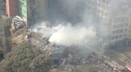 Aftermath footage shows collapse of 26-storey tower