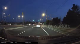 Pedestrian and dog almost hit by car