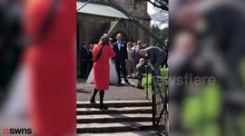 A JCB driver and his new bride stunned guests when they turned up to their wedding reception – in the bucket of a giant DIGGER