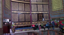 World's largest Quran carved from wooden boards stacked 15 metres high in Indonesia