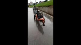 Two men carrying dangerous iron bars on the road