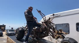 Man on the very unusual motorcycle