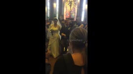 Newlyweds walking out the church