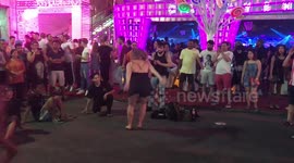 Partying woman silences breakdancing posers with hilarious backflips