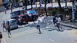 Two group people fighting on the road
