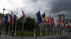 European Union flags are joint together at Parliament square, London