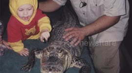 Daughter surrounded by Gators Alone