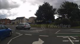 French car driver ignorant on how lane discipline & roundabouts work in the UK