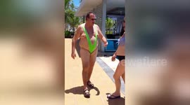 American man parades around pool in 'Borat'-style mankini after losing bet