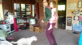 Mama wears 3-year-old on back- Happy family