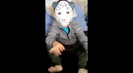 Kid is wearing a Tiger Mask