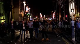Police arrest new year revellers, in Wind Street, Swansea, UK