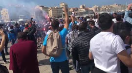 Marseille fans set off flares and chant ahead of Europa League final