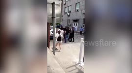 Women 'beaten for wearing rainbow badges' at Beijing arts event