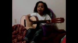 Little girl wants to be a rockstar