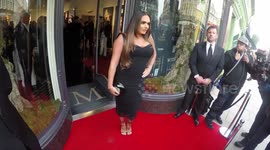 Tamara Ecclestone poses for cameras at London art launch
