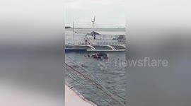 Two children rescued from sinking car after 'father left handbrake off'