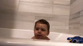 Toddler saying his bedtime prayers