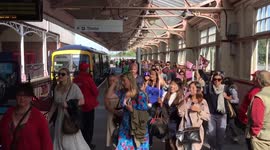 Arriving at Windsor by train on royal wedding day