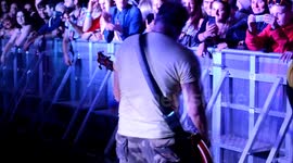 Peter Hook from Joy Division on stage at Lounge on the Farm in Kent