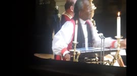 Australian family giggles uncontrollably during reverend's speech