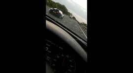Passing a Bugatti Veyron on the M40