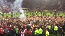 Rotherham United fans invade pitch after semi-final against Scunthorpe United