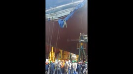 Ship builders rescued after cargo ship scaffolding collapses
