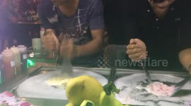 Making ice cream rolls in Vietnam