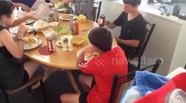 Tomato Sauce prank goes wrong...when too much baking soda is wrong. Everyone around the table was in on it except the guy in the red shirt