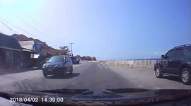 Over-taking bus has near miss with oncoming car