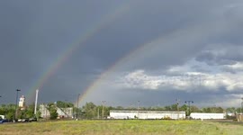 Rare occurence in the Denver sky with 2 rainbows on the east overlooking the city