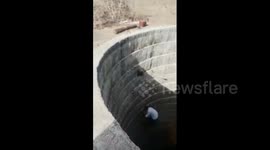 Brave villager gets down 80-feet well to rescue monkey